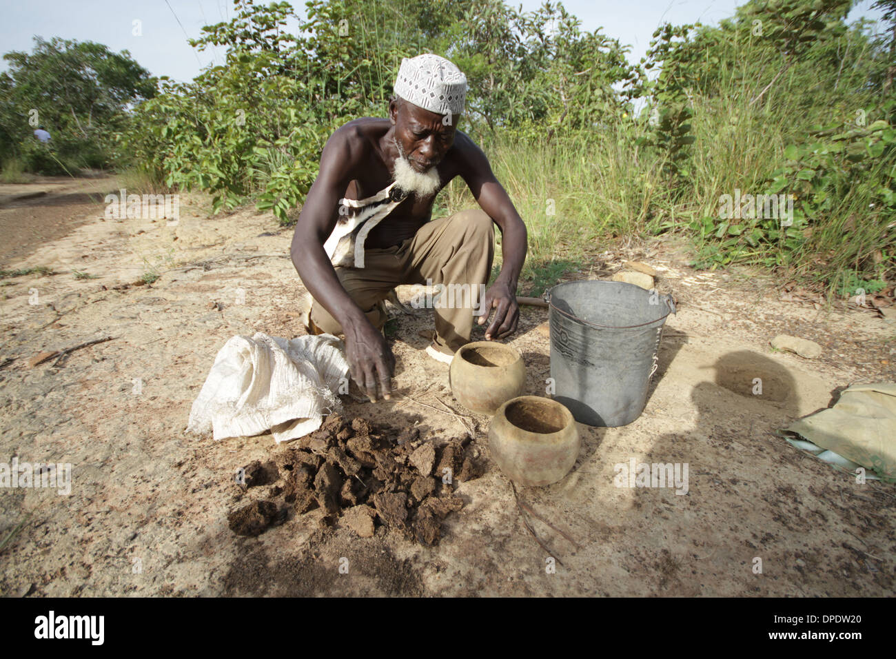 At work in the fields, Ghana Stock Photo