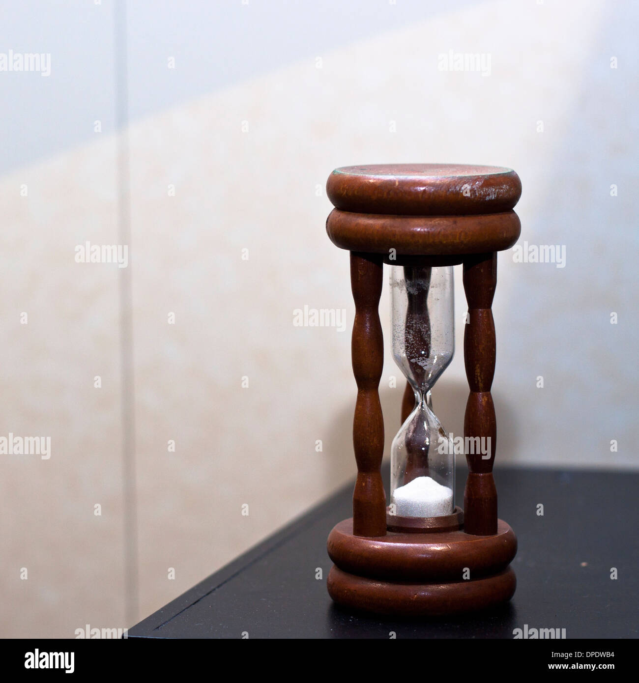 Brown wooden sand clock. Stock Photo