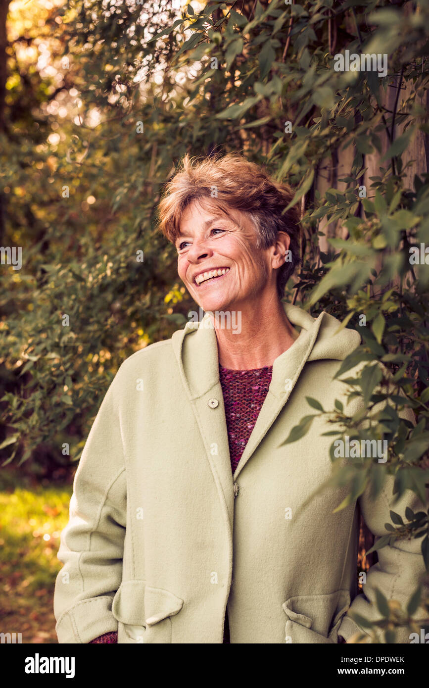 Portrait of mature woman in garden Stock Photo - Alamy