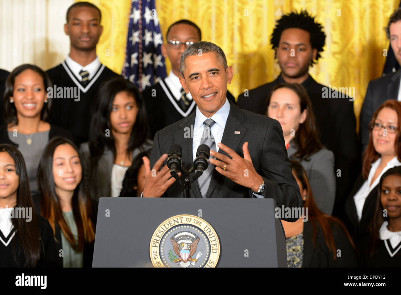 US President Barack Obama announces the first five ÒPromise Zones,' located in San Antonio, Philadelphia, Los Angeles, Southeastern Kentucky, and the Choctaw Nation of Oklahoma in the East Room of the White House January 9, 2014 in Washington, DC. Stock Photo