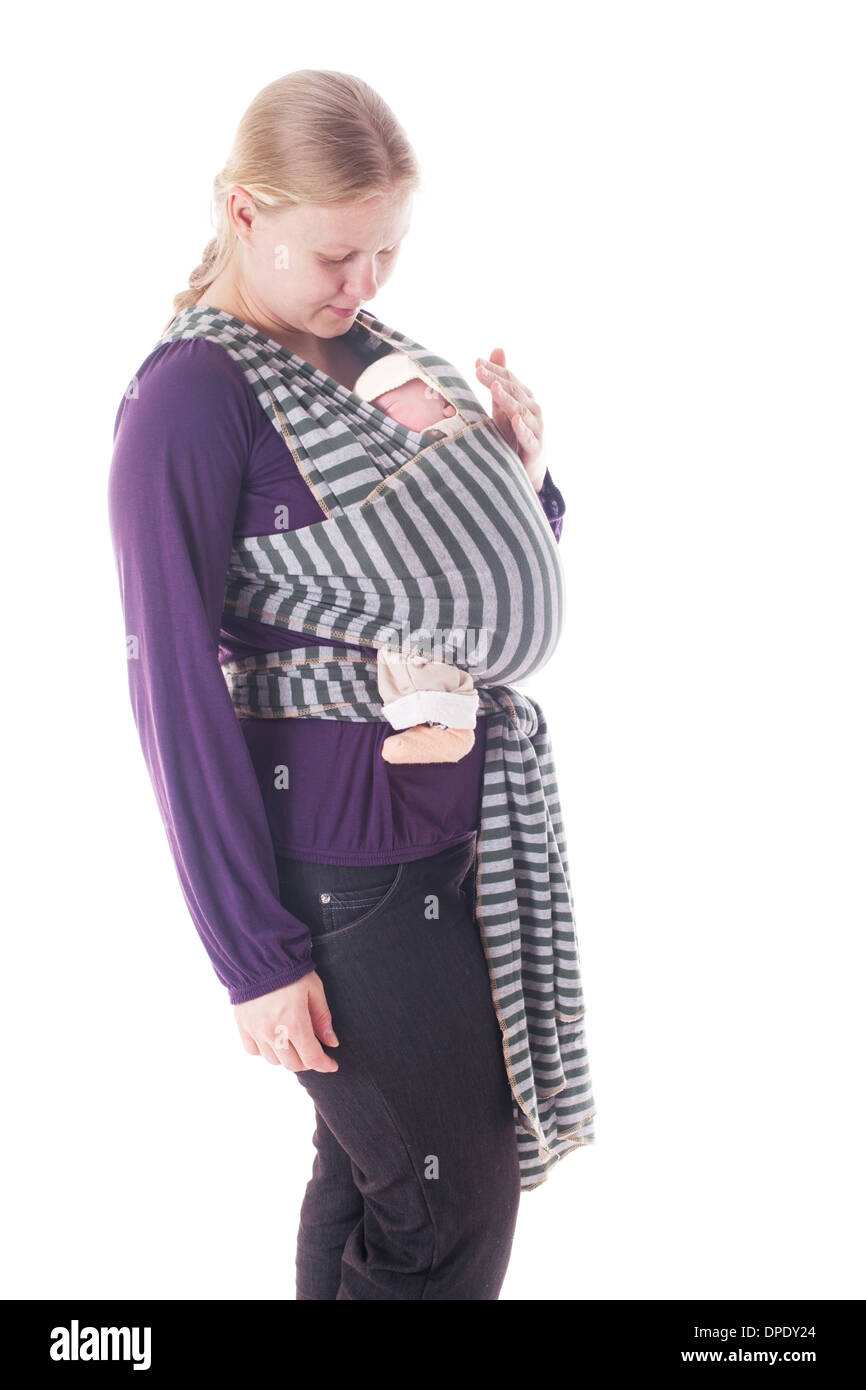 Newborn baby in sling Stock Photo