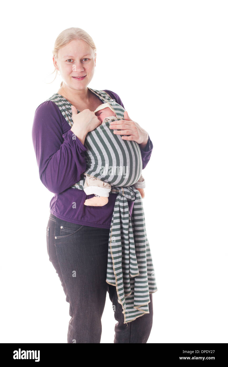 Newborn baby in sling Stock Photo