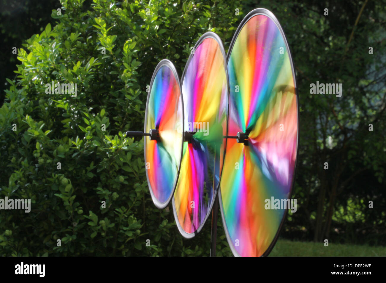 Colorful wind wheel in garden Stock Photo