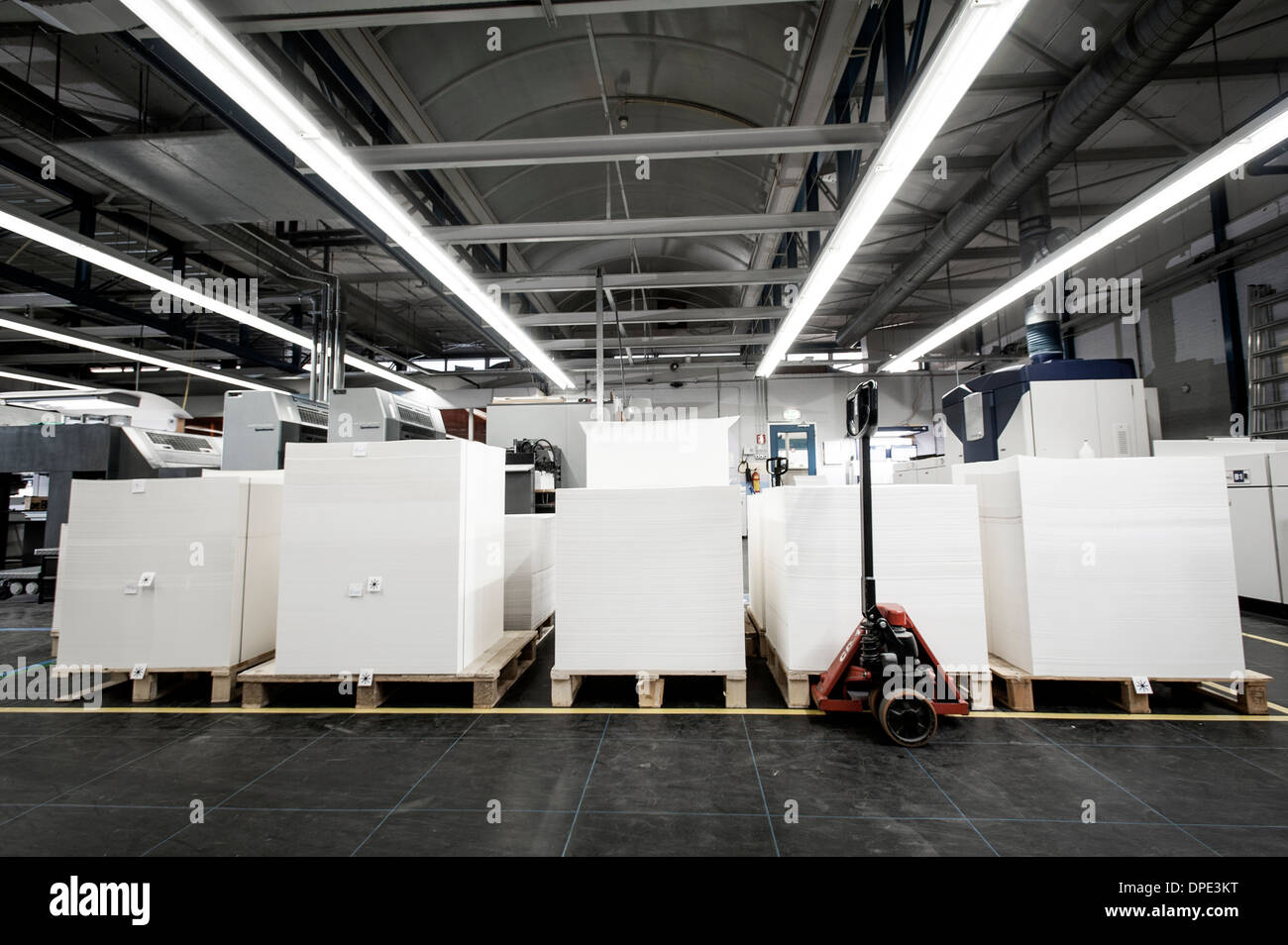 Pallets of paper in printing warehouse Stock Photo