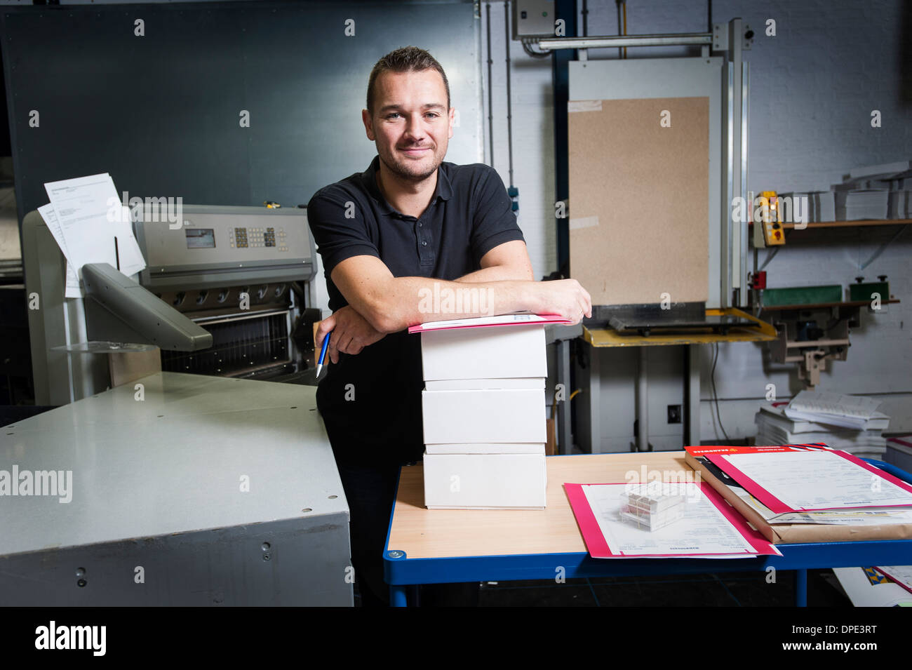 Portrait of worker in paper printing workshop Stock Photo