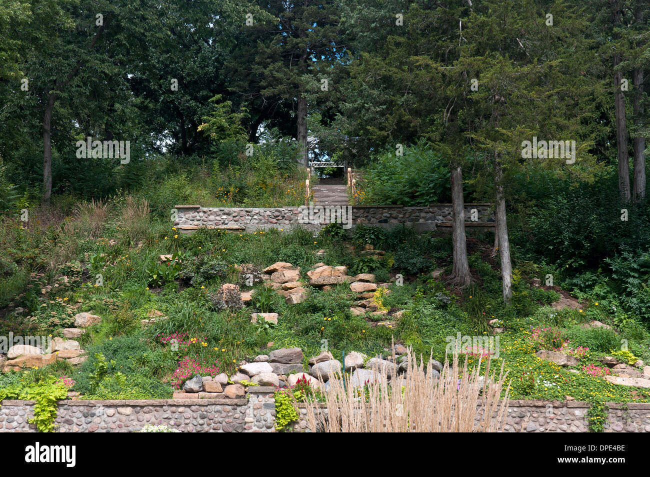 Sibley Park rock garden and walking trail leading to pergola in Mankato
