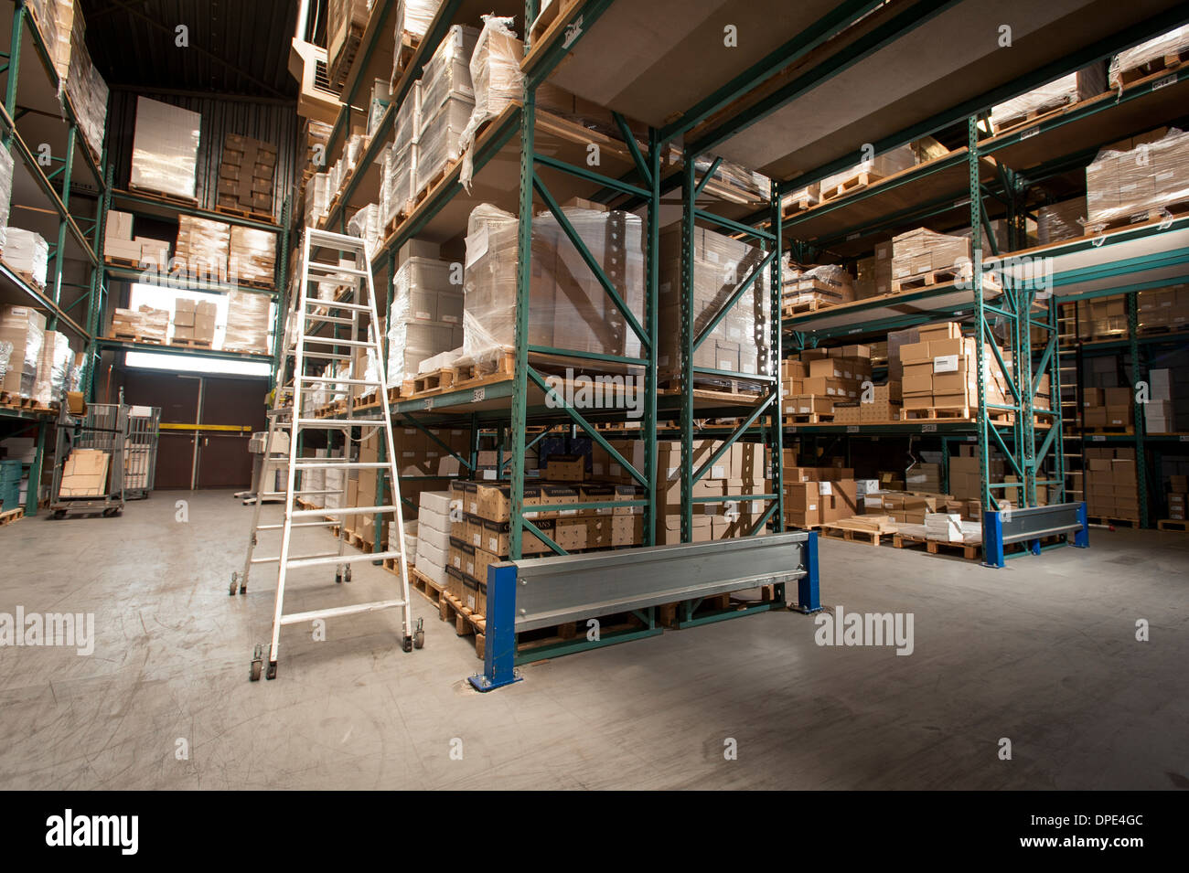 Shelves of stock and orders in printing warehouse Stock Photo