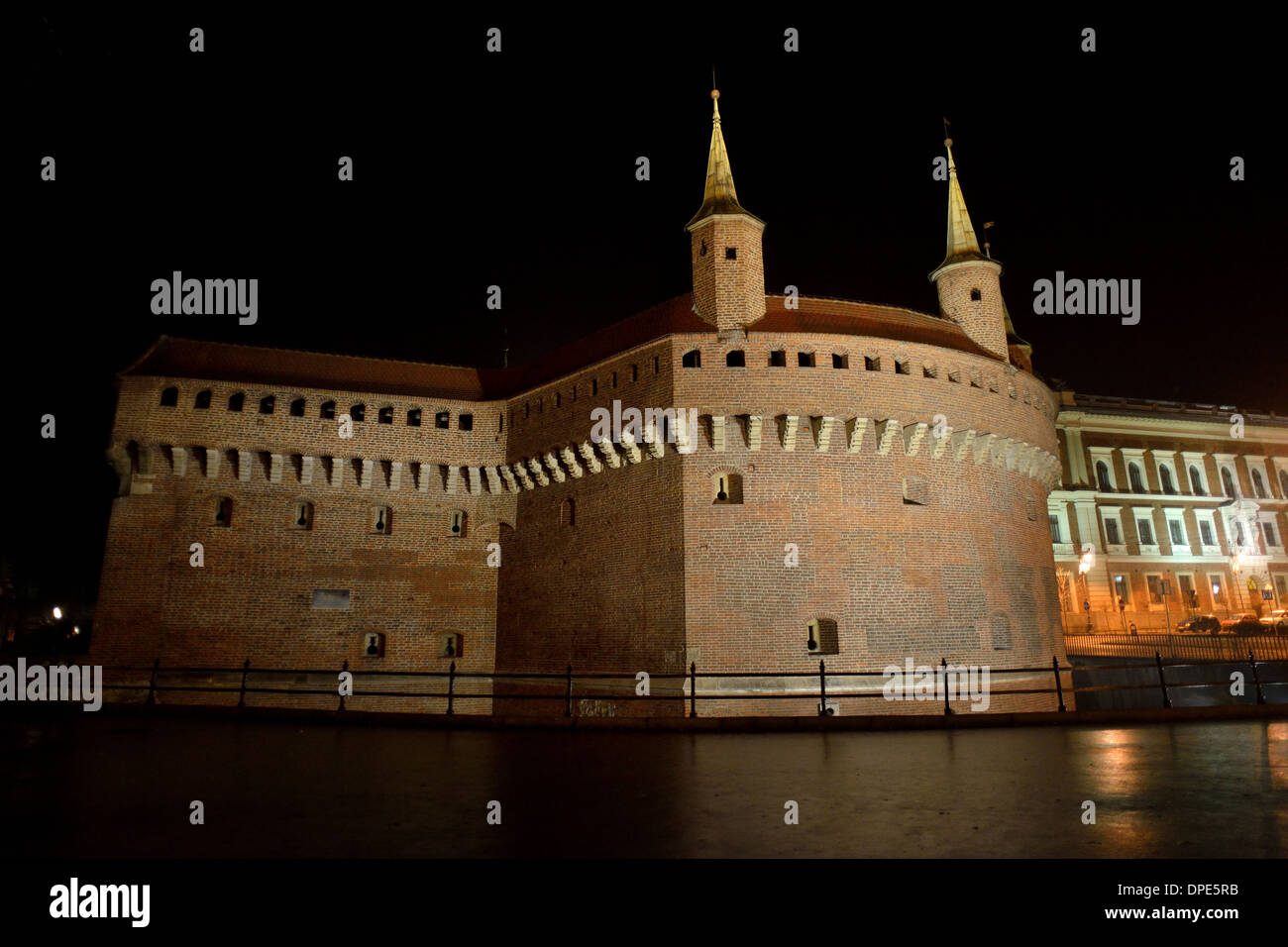 Krakow (Cracow),  Barbican night view. Stock Photo