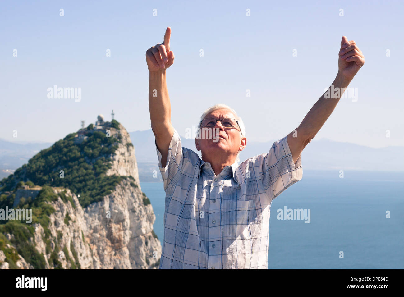 Portrait of happy senior man tourist at the Rock of Gibraltar. Stock Photo