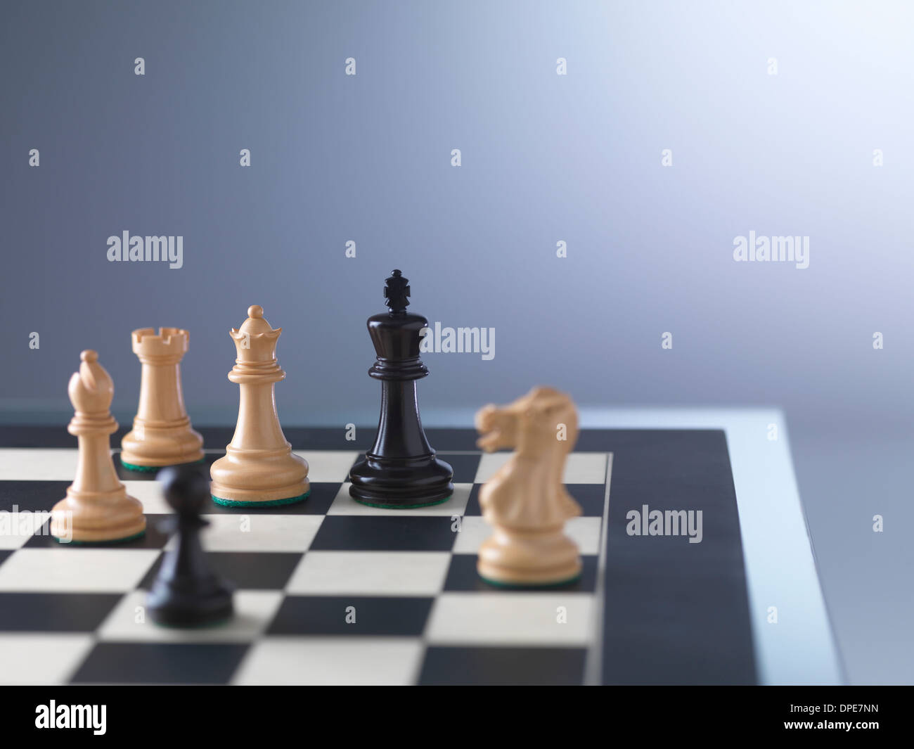 Chess Board with King, Queen and Rook in Checkmate Stock Photo - Alamy