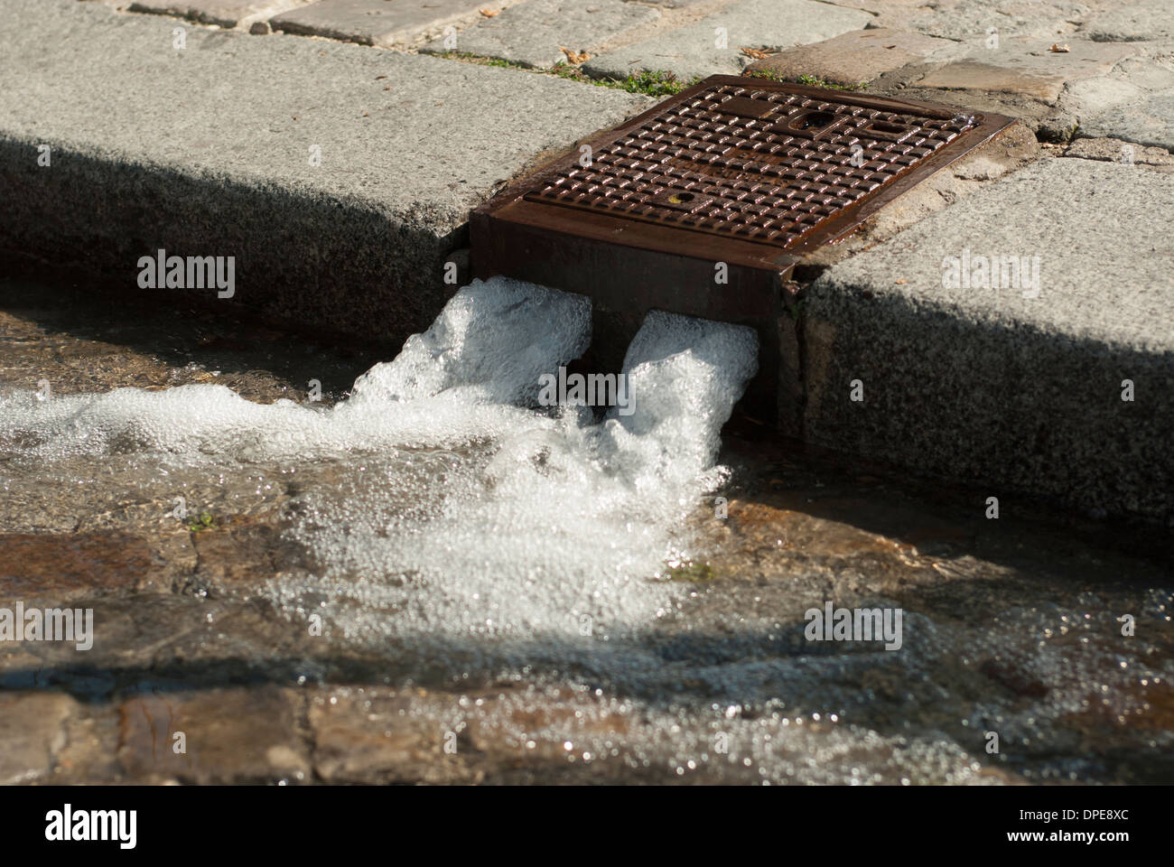 Washing Outlets cleaning the streets of Paris Stock Photo