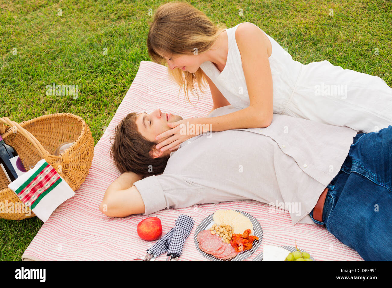 Attractive Couple Enjoying Romantic Sunset Picnic in the Countryside ...