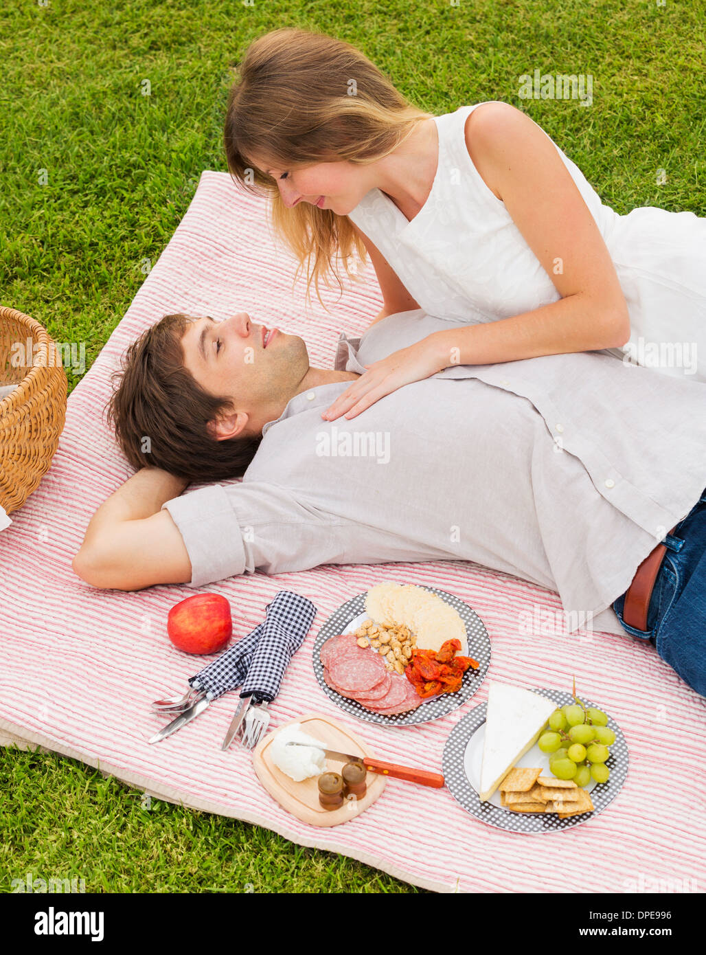 Attractive Couple Enjoying Romantic Sunset Picnic in the Countryside ...