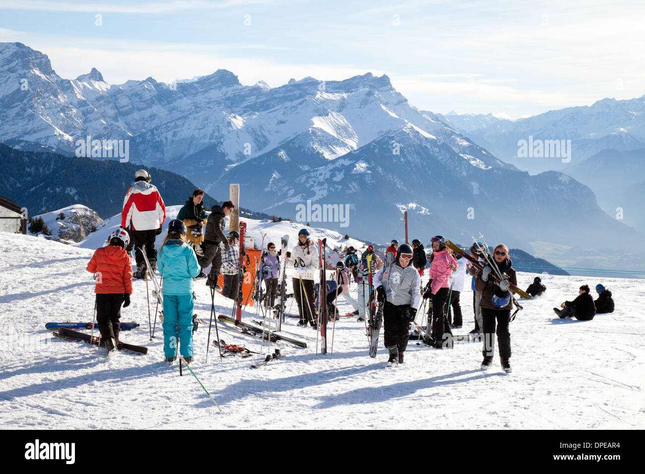 Skiers skiing in the Swiss Alps at La Berneuse, 2048 metres, Leysin, Vaud, Switzerland, Europe Stock Photo