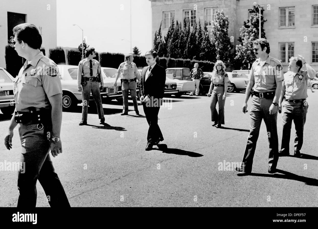 Surrounded by Sheriff's deputies, Gerald Gallego left the Contra Costa County Courthouse on May 25, 1983 where a jury recommended he be executed in the gas chamber for killing two California State University, Sacramento, sweethearts.  Gallego murdered Craig Miller and Mary Beth Sowers November 2, 1980. Stock Photo