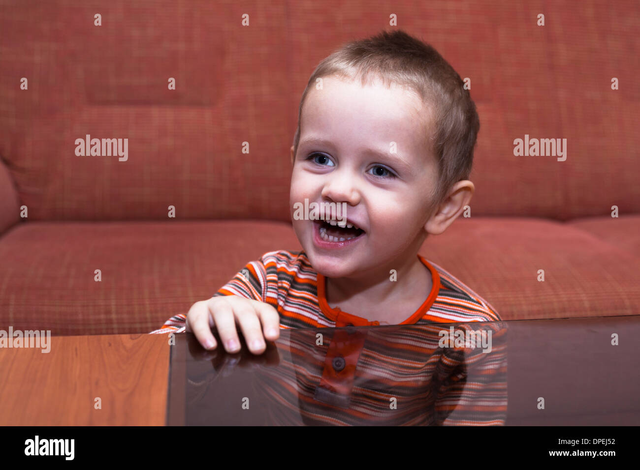 Happy kid smiling at home Stock Photo