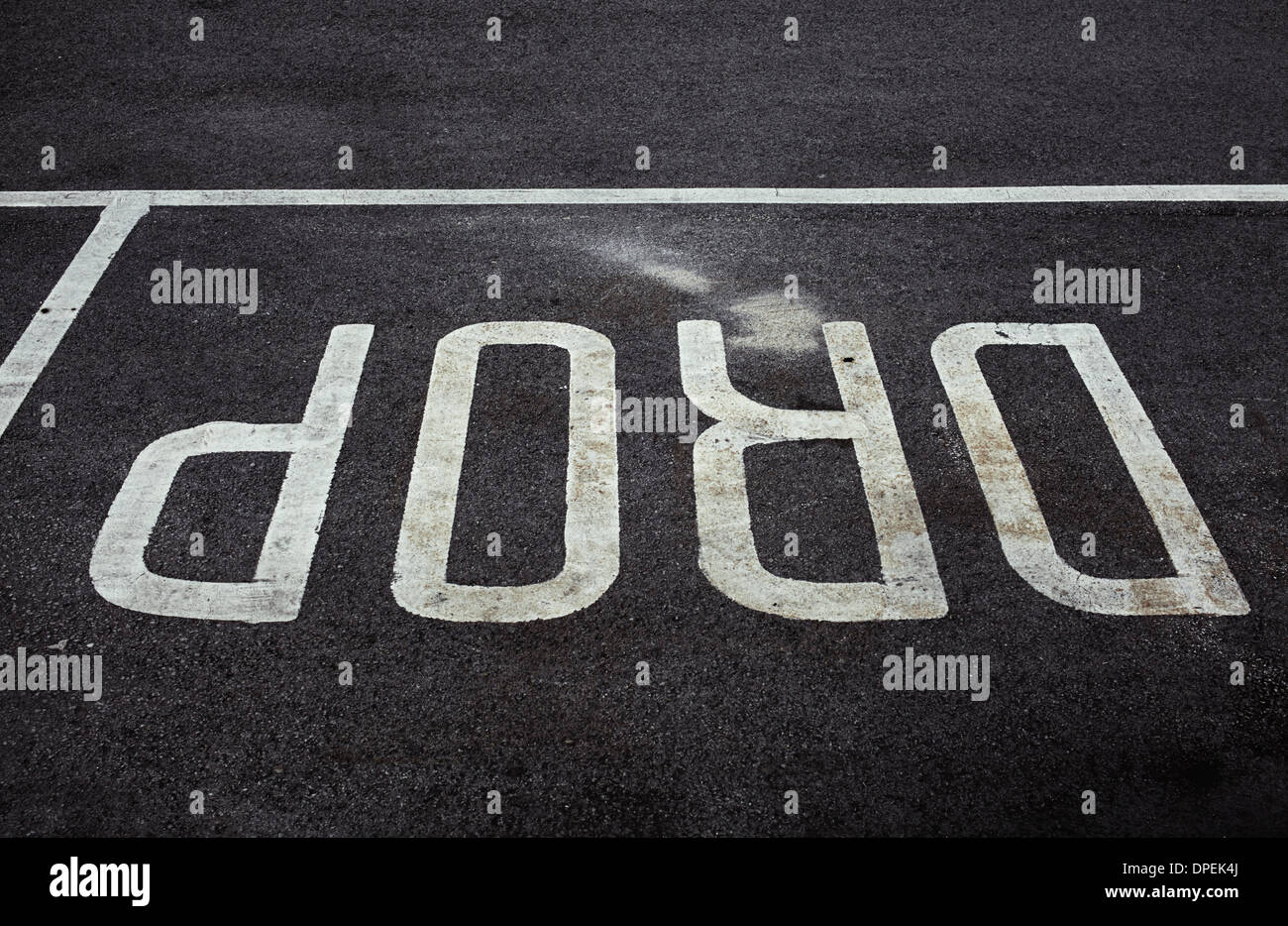 DROP word painted on road Stock Photo