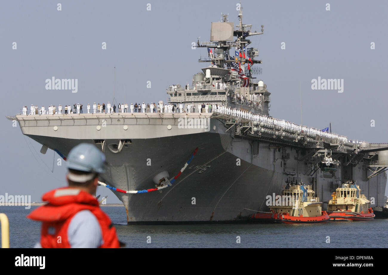 (Published 6/7/2005, B-3:1,7)  The USS Bonhomme Richard pulled into San Diego with the Expeditionary Strike Force after a six month deployment. While on deployment, the ship and the 15th Marine Expeditionary Unit delivered more than 50 tons of humanitarian assistance to tsunami victims in the Indonesian Island of Sumatra.UT/DON KOHLBAUER Stock Photo