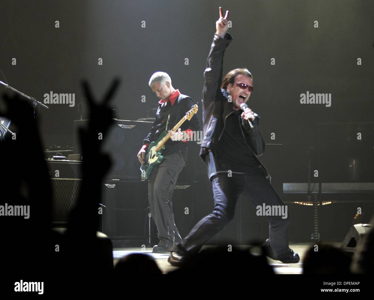 Published 3/29/2005, A-1) Bono and Adam Clayton at the opening of the U2 concert in San Diego Monday night to kick off their Vertigo tour in the