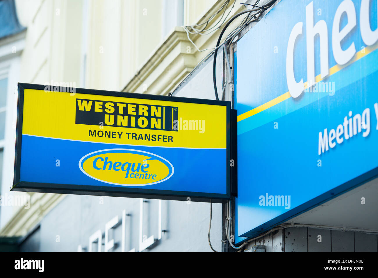 Cheque Centre and Western Union money transfer signage on high street premises in Fareham, Hampshire. Stock Photo