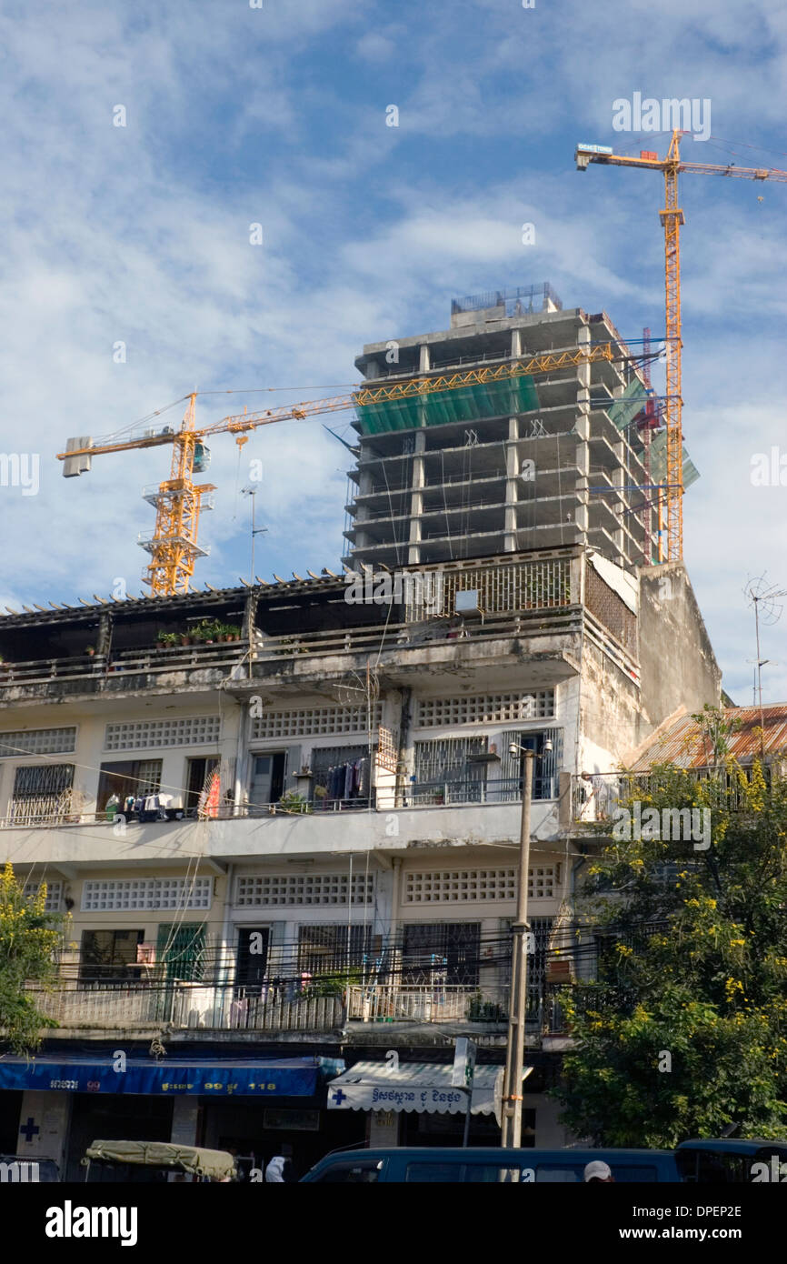 Large and tall cranes used to build skyscrapers towers over a