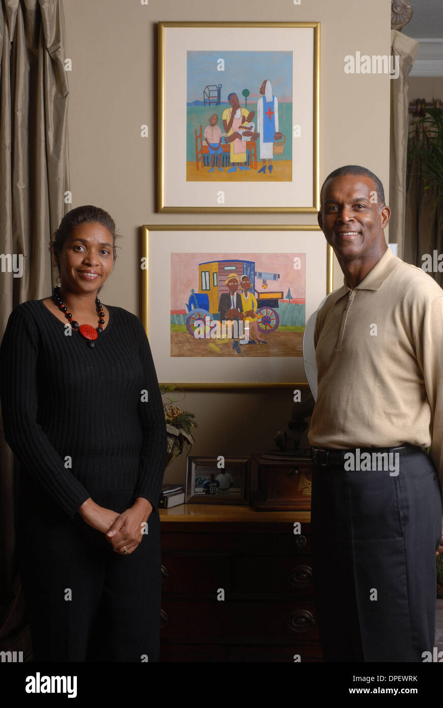 Darden Restaurants CEO Clarence Otis, right, with his wife, Jacqui