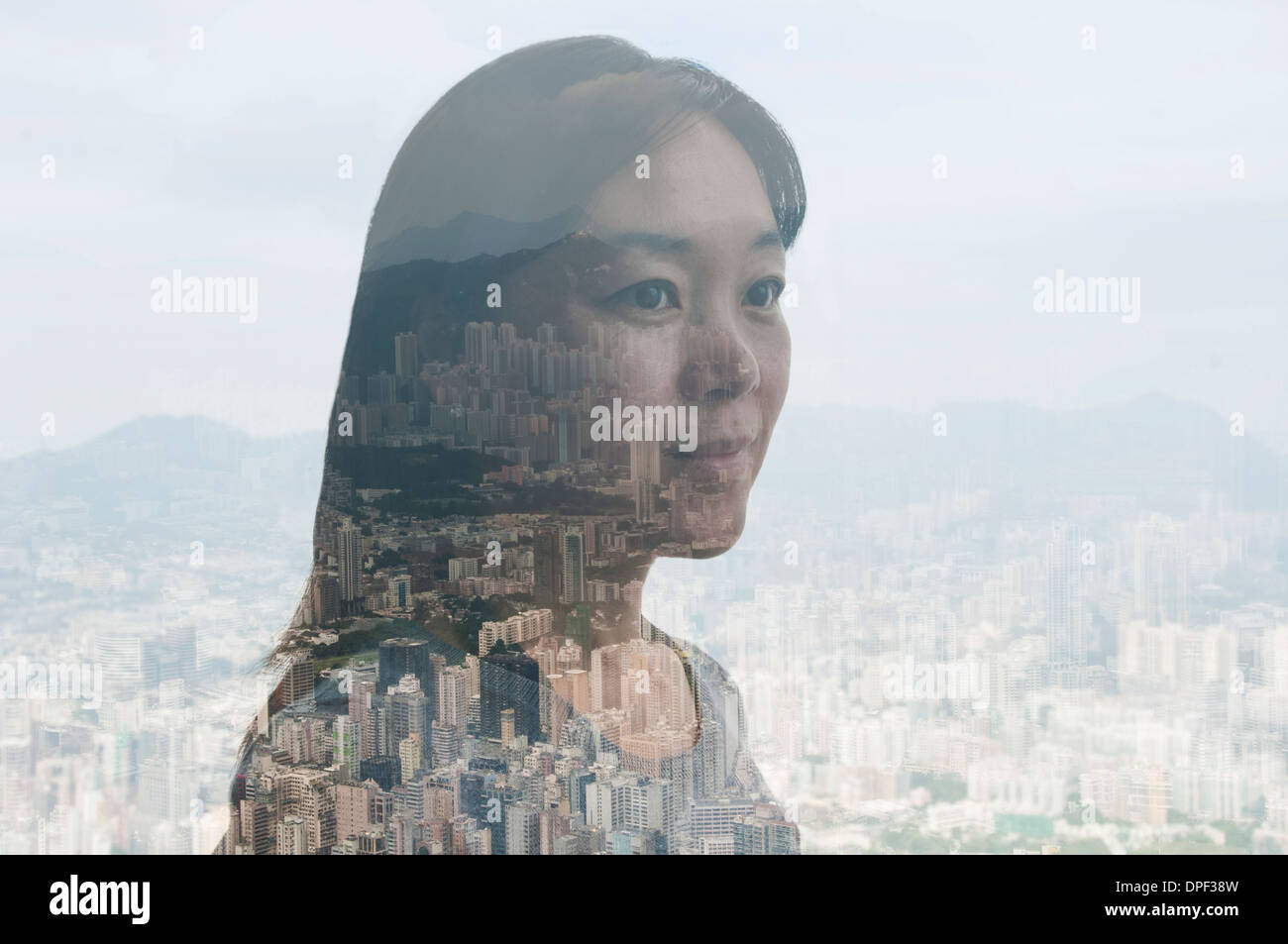 Businesswoman and Hong Kong cityscape, composite image Stock Photo