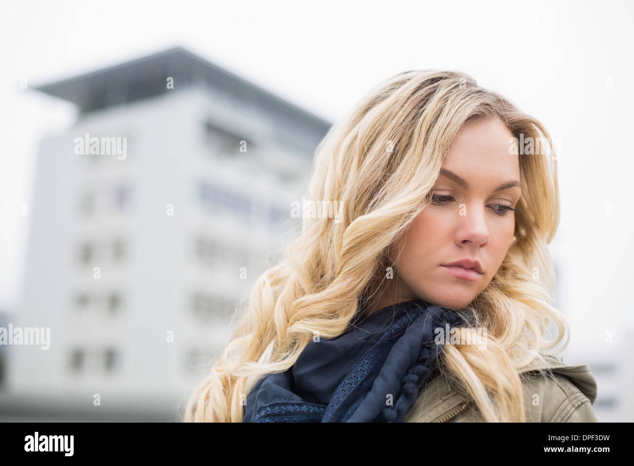 Young attractive blonde posing outdoors Stock Photo