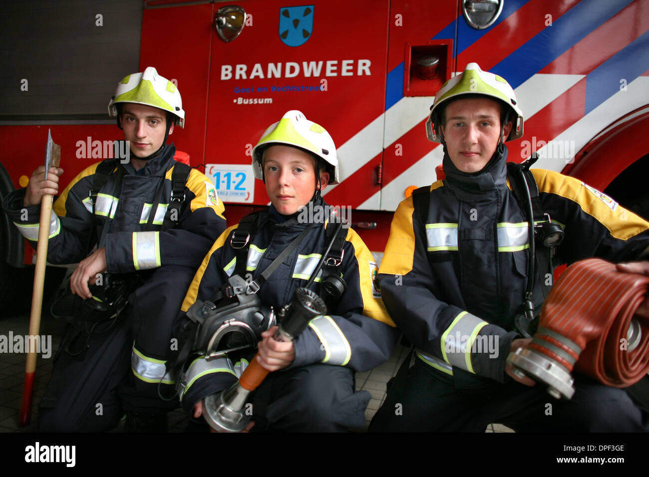 Dec 21, 2006 - Leiden, Netherlands - Firefighters (historically, firemen) are rescuers extensively trained primarily to put out hazardous fires that threaten civilian populations and property, to rescue people from car incidents, collapsed and burning buildings and other such situations. The increasing complexity of modern industrialized life with an increase in the scale of hazard Stock Photo