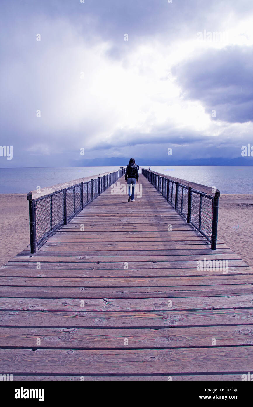 Man walking on jetty hi-res stock photography and images - Alamy