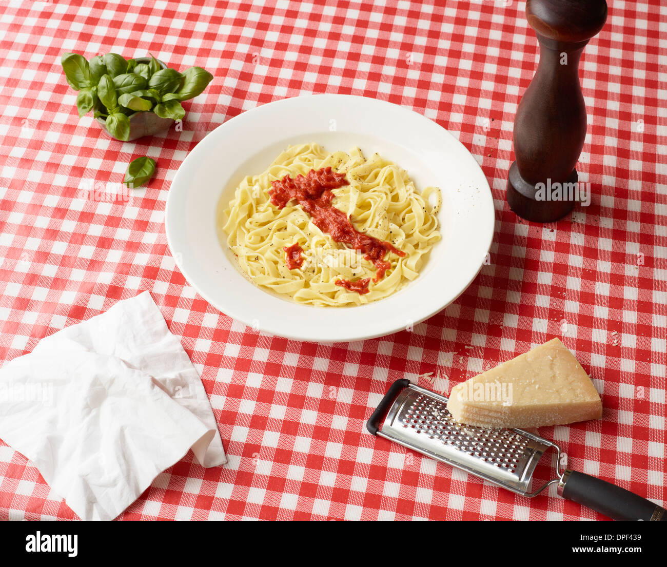 Tomato pasta sauce in shape of Italy Stock Photo