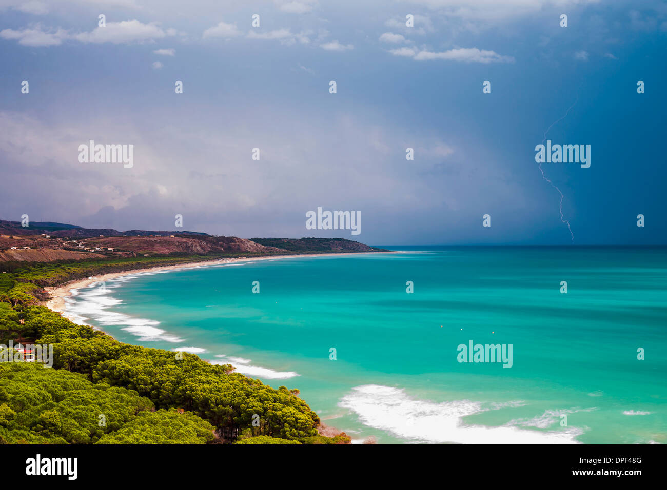 Thunder and lightning storm over Capo Bianco Beach and the Mediterranean Sea in the Province of Agrigento, Sicily, Italy, Europe Stock Photo