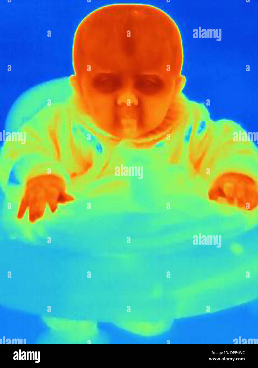 Thermal image of six month baby boy in baby walker Stock Photo