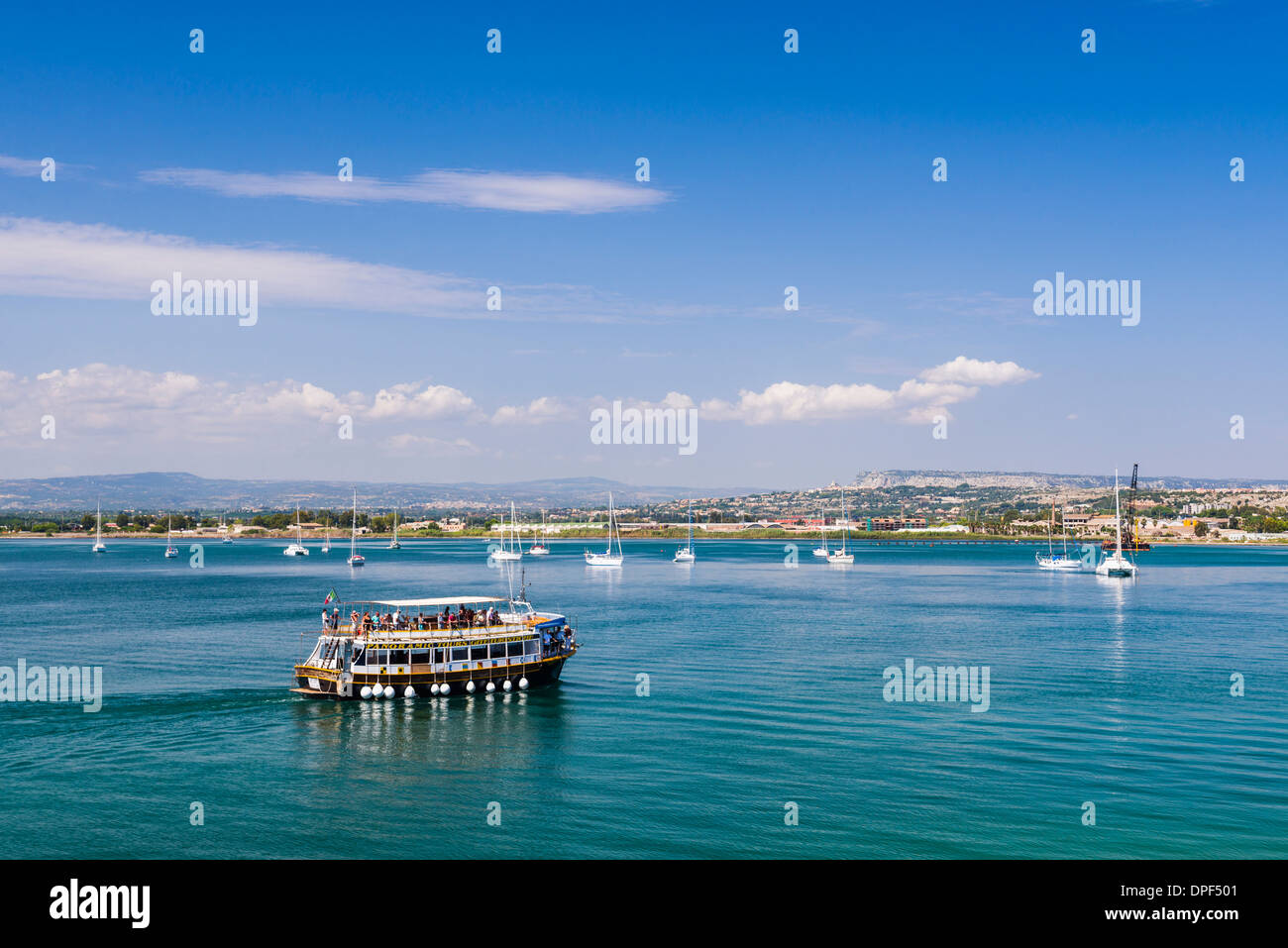 Tourist boat trip in Ortigia (Ortygia) harbour, Syracuse (Siracusa), Sicily, Italy, Mediterranean, Europe Stock Photo