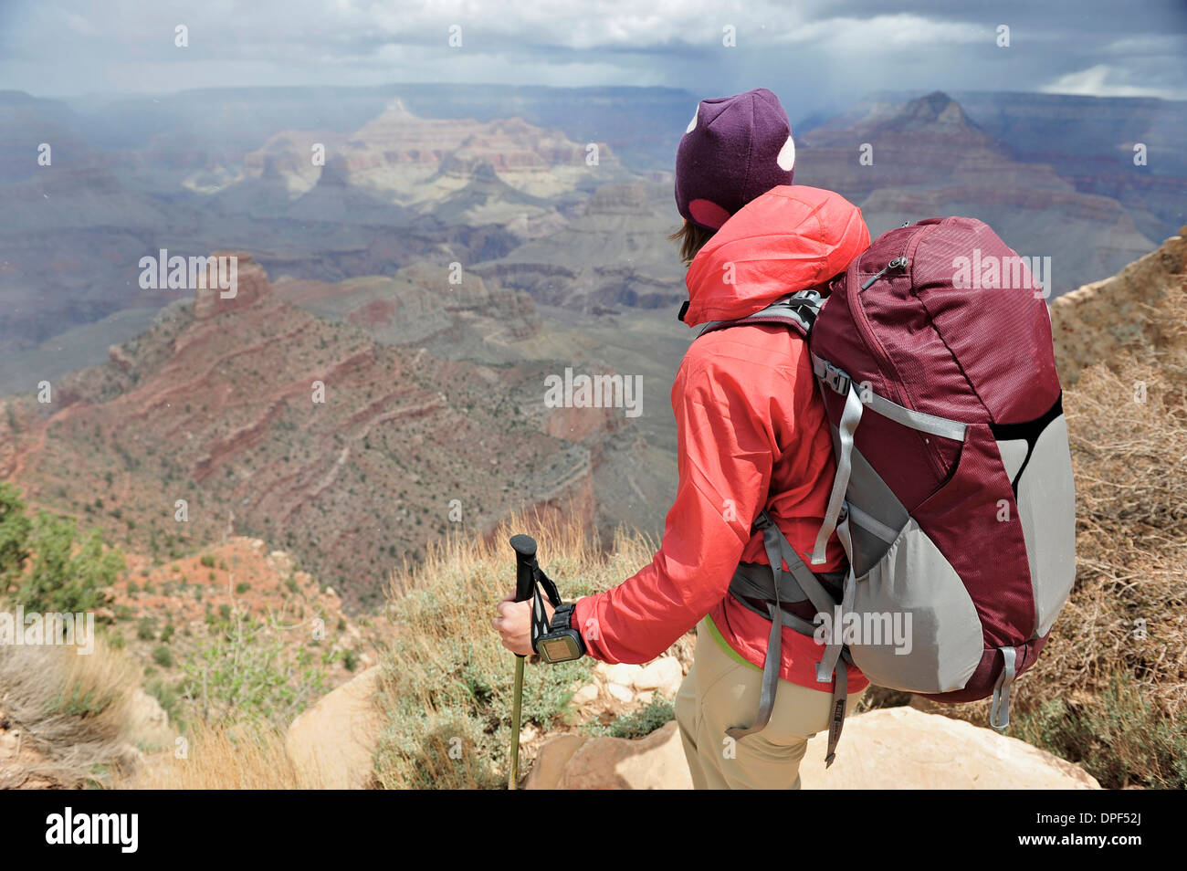Female hiker looking toward Grand Canyon, Flagstaff, Arizona, USA Stock Photo