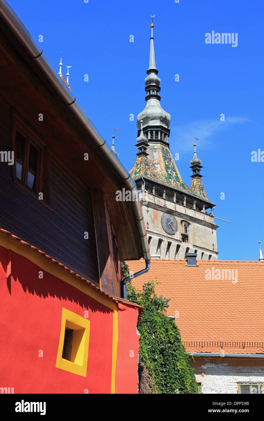 Looking past colourful houses towards the Clock Tower, in medieval