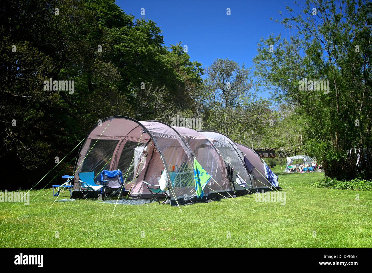 Tent at campsite on a hot and sunny summers day, camping holiday Stock Photo