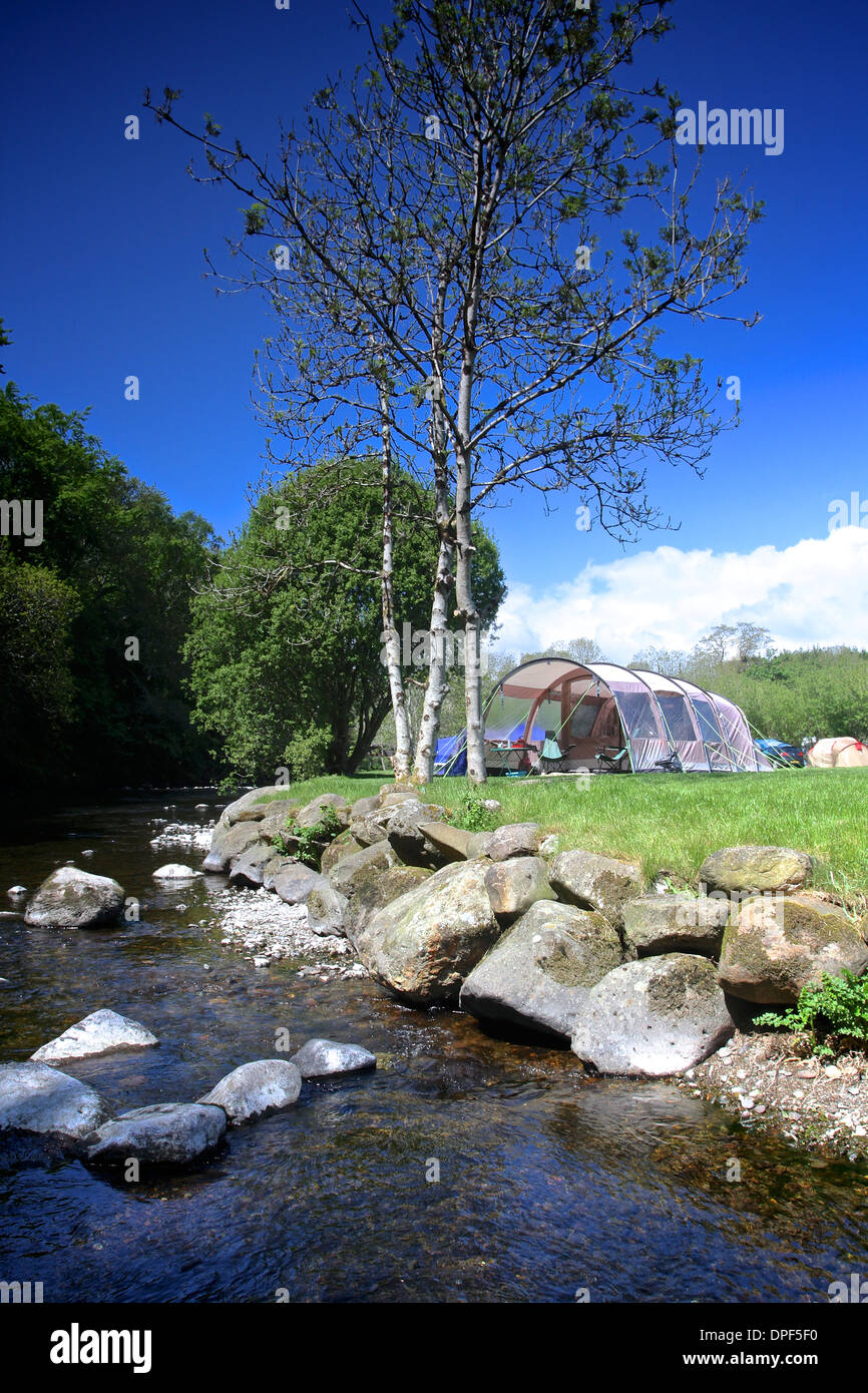 Tent at campsite on a hot and sunny summers day, camping holiday Stock Photo