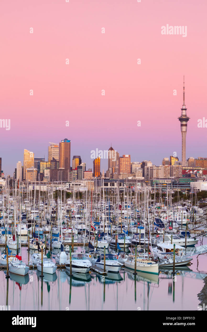 Westhaven Marina & city skyline illuminated at dusk, Waitemata Harbour, Auckland, North Island, New Zealand, Australasia Stock Photo