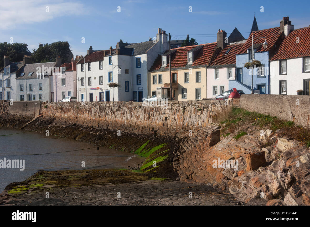 Harbour Wall Low Tide And Pastel Coloured Cottages St Monan