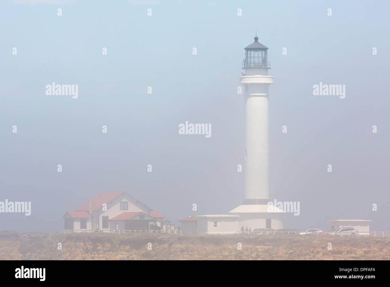 Point Arena Lighthouse in fog, Mendocino County, California, United States of America, North America Stock Photo