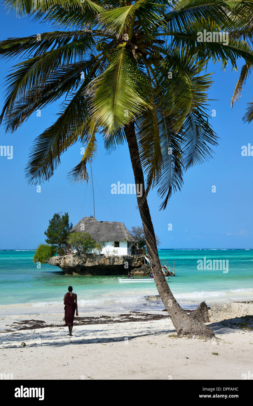 Masai tribesman on Bwejuu Beach, The Rock Restaurant, Zanzibar, Tanzania, Indian ocean, East Africa, Africa Stock Photo