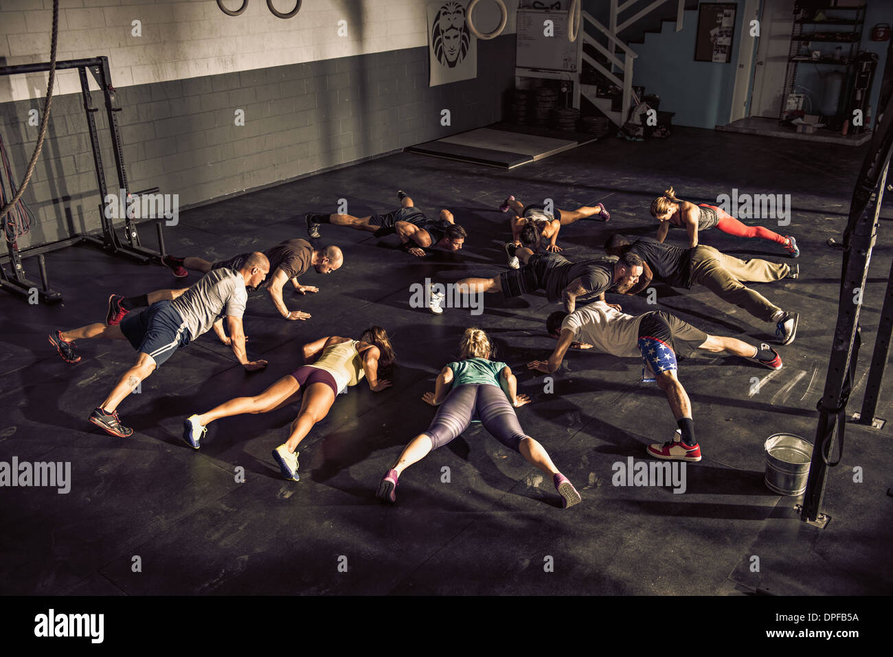 Fitness class training together in gym Stock Photo