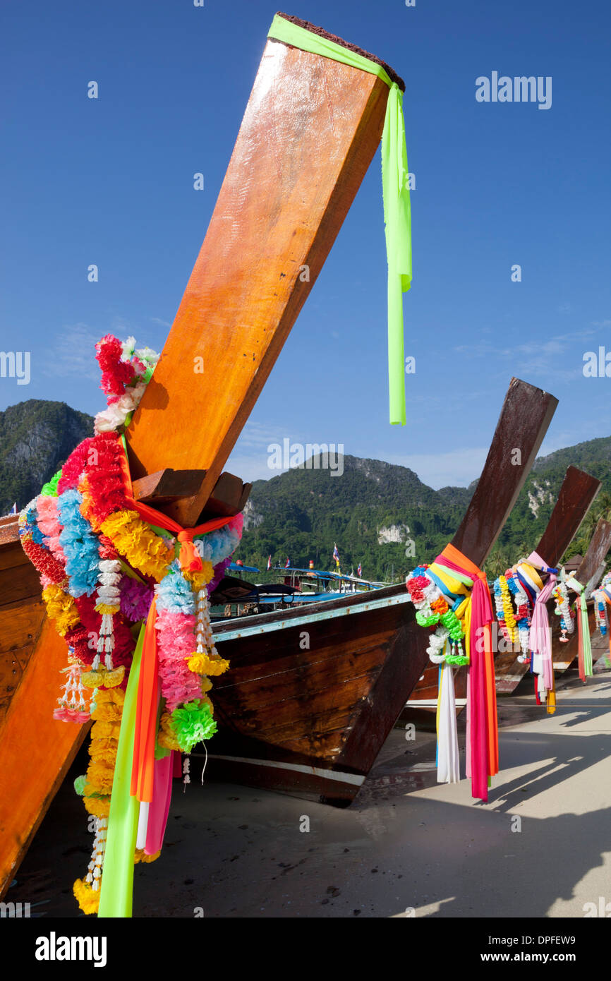 Garlands decorating long-tail boats, Koh Phi Phi, Krabi Province, Thailand, Southeast Asia, Asia Stock Photo
