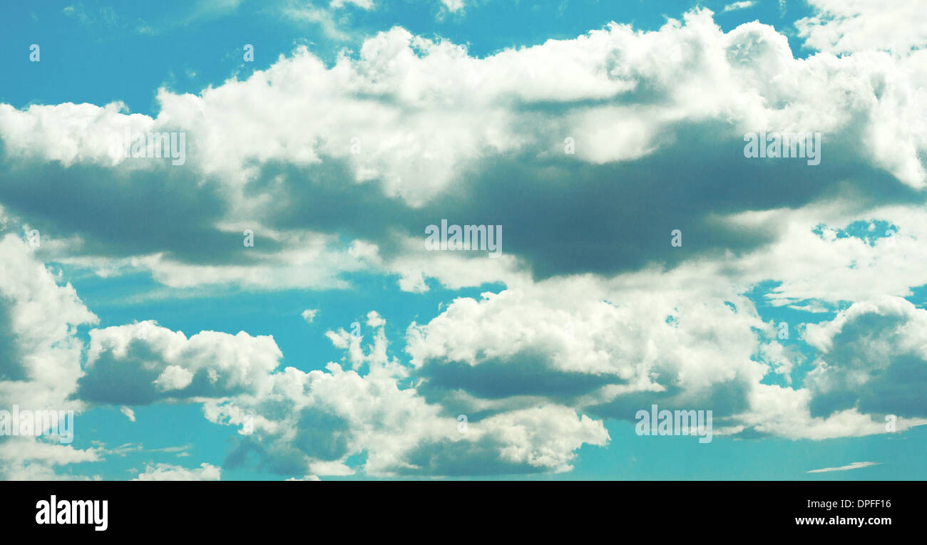 Flying the heavy clouds in the blue sky Stock Photo