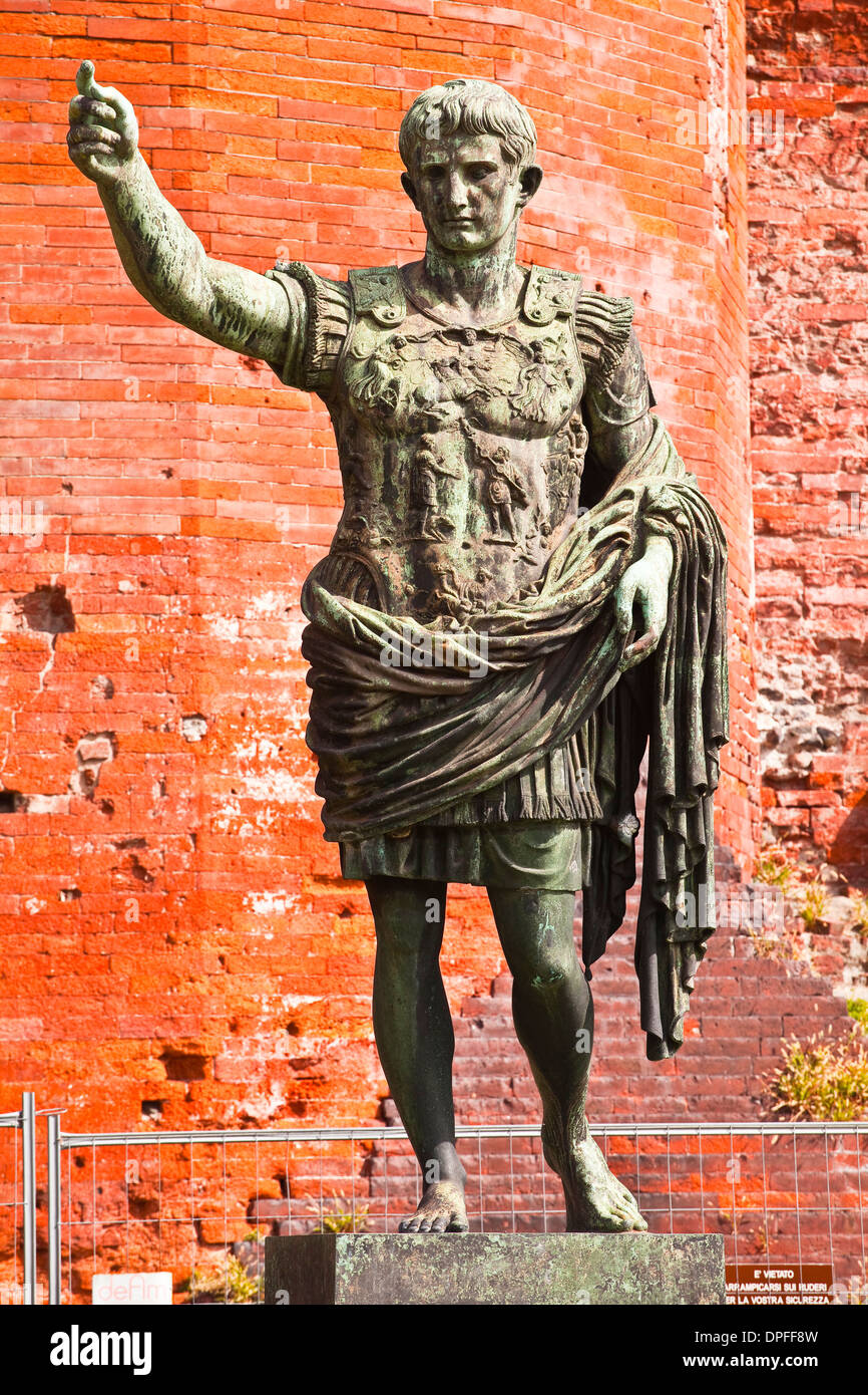 A statue of Caesar Augustus in front of Porta Palatina, Turin, Piedmont, Italy, Europe Stock Photo
