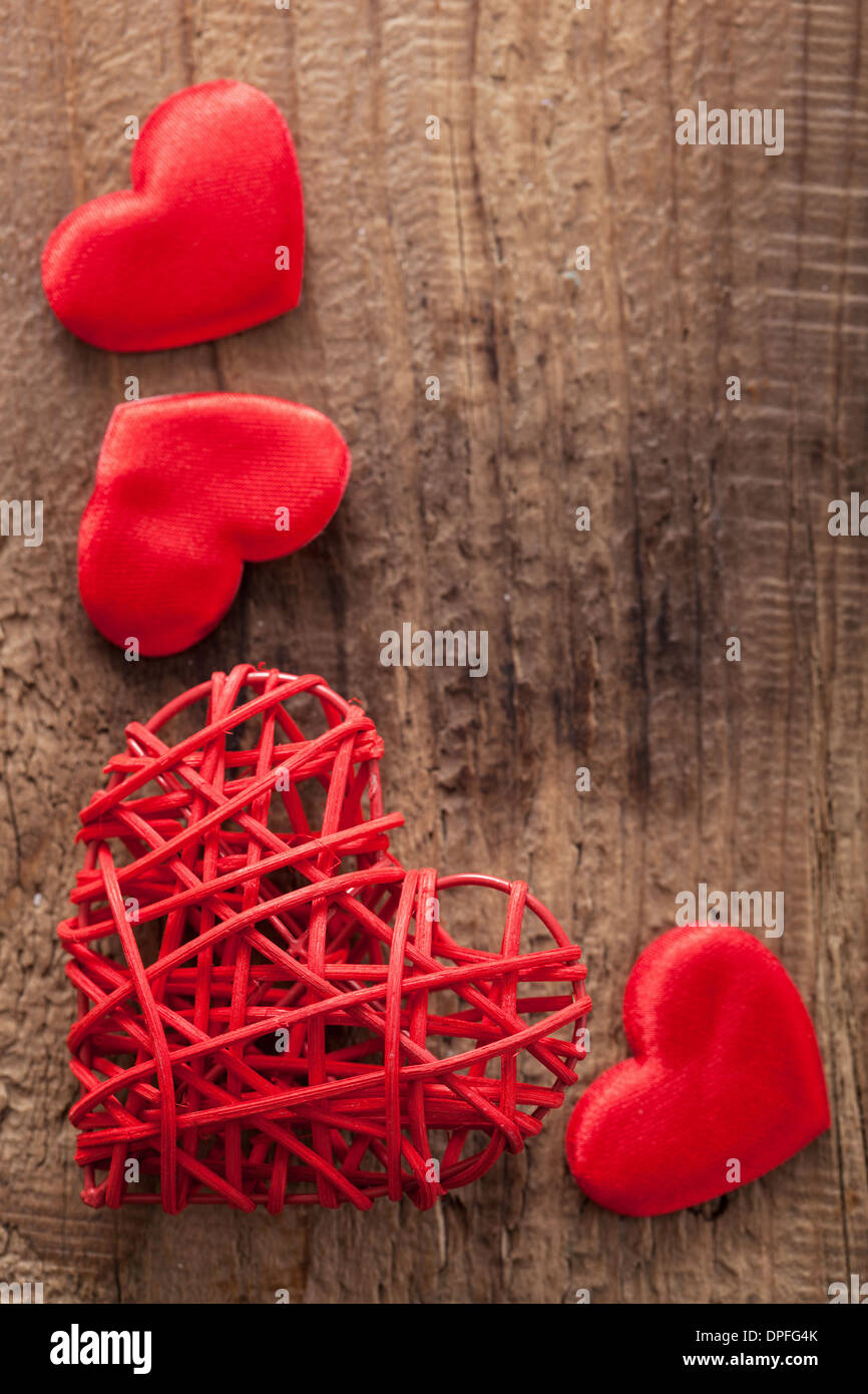 red hearts over wooden background for Valentines day Stock Photo - Alamy