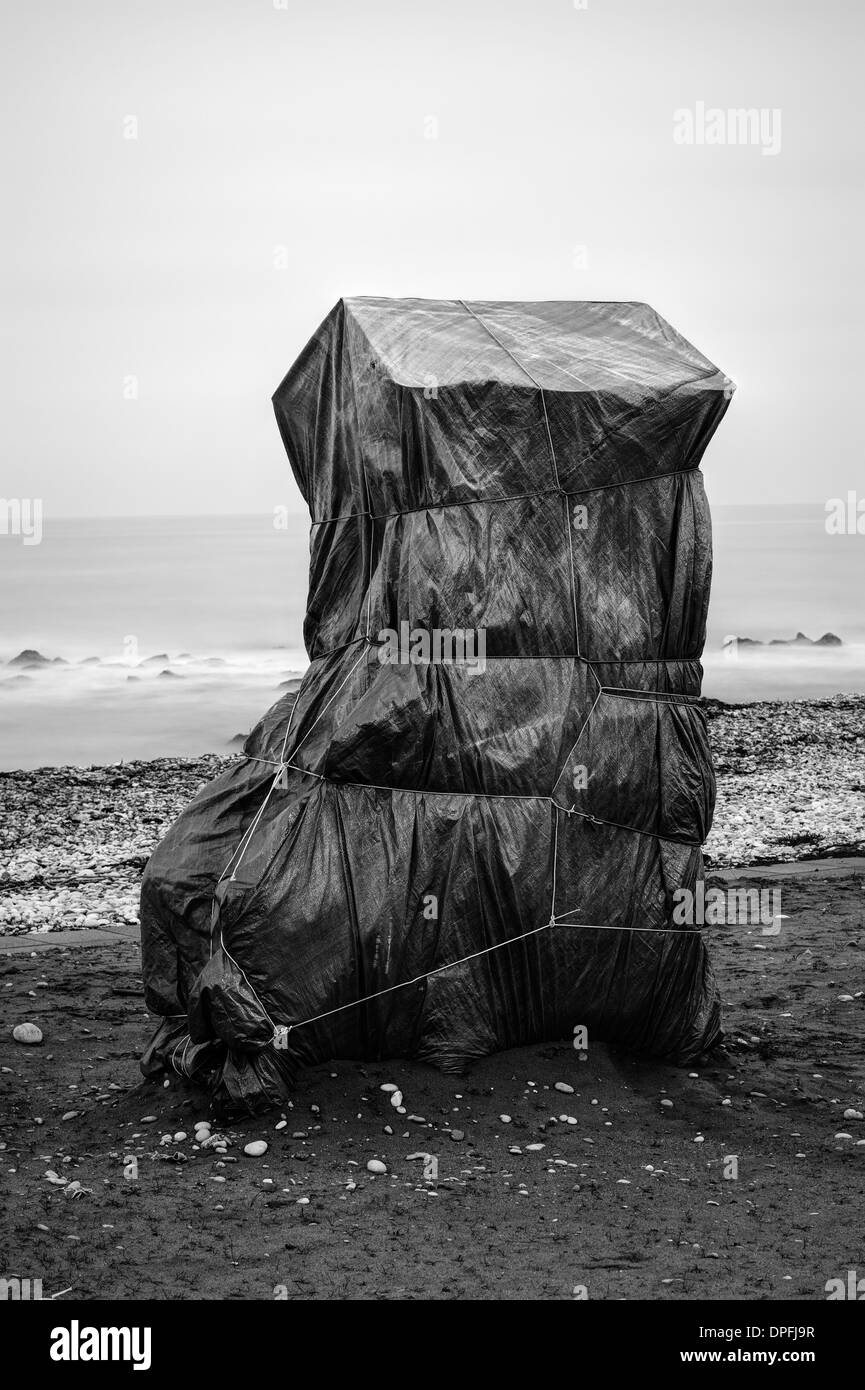 Packed object on the beach Stock Photo