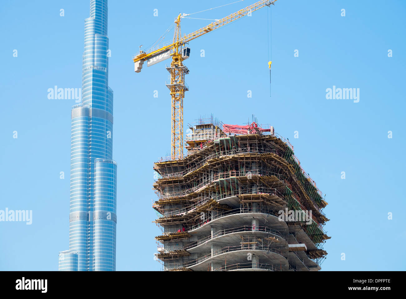 New high-rise office tower under construction at new Business Bay commercial and residential area in Dubai United Arab Emirates Stock Photo