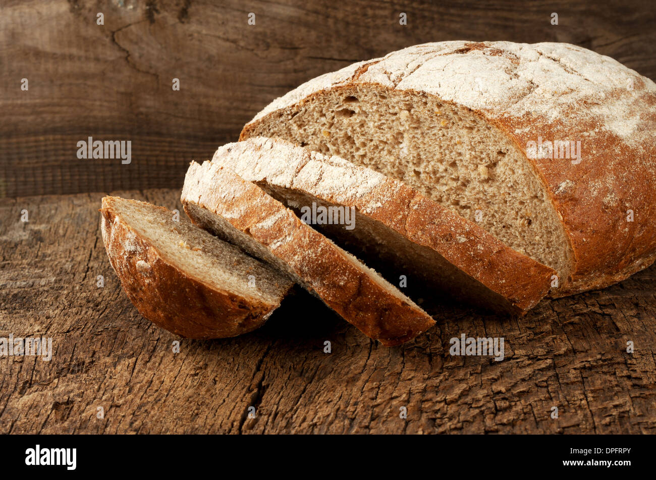 Sliced rye bread on a wooden table Stock Photo